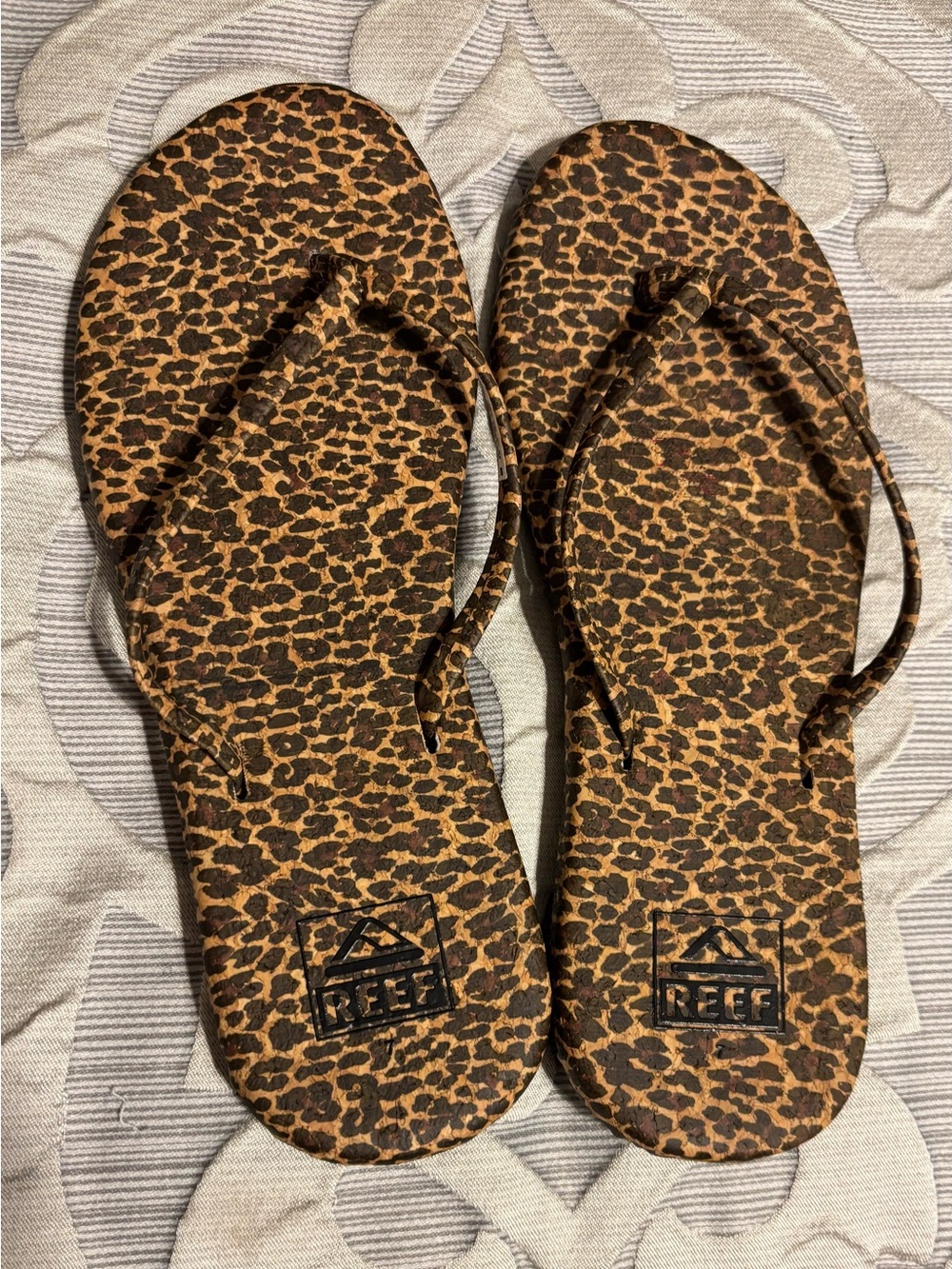 Reef Leopard-Print Flip Flops in Brown and Black
